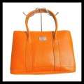 Orange hand bags